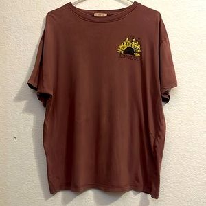 Cute little t-shirt. Worn maybe once or twice. Has one small hole on the side.